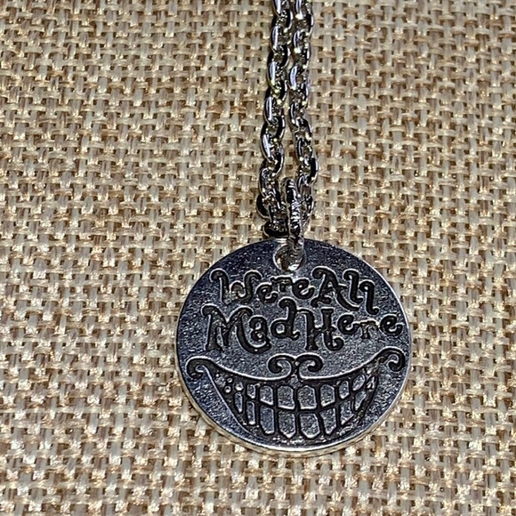 Twinsdesign Jewelry - Alice in Wonderland We’re All Mad here quote  Necklace